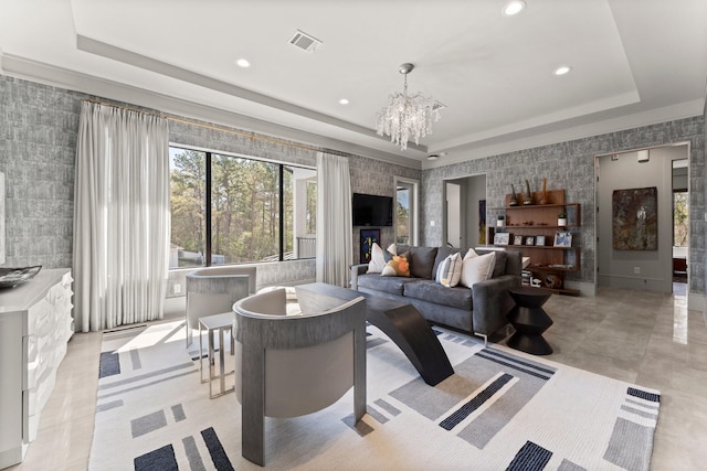 living area with visible vents, a chandelier, a tray ceiling, recessed lighting, and light tile patterned flooring