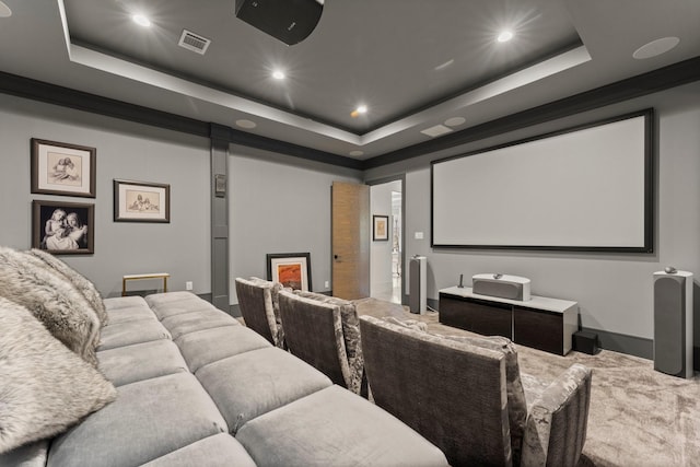 home theater with visible vents, recessed lighting, a raised ceiling, and carpet