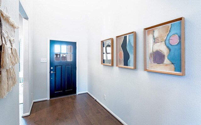 2409 Seaglass Terrace Dr, Katy, TX 77493 - entryway featuring dark wood-style floors and baseboards