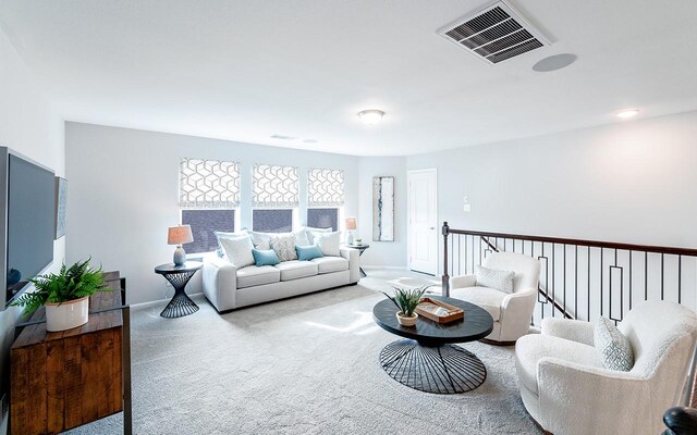 2409 Seaglass Terrace Dr, Katy, TX 77493 - carpeted living area featuring baseboards