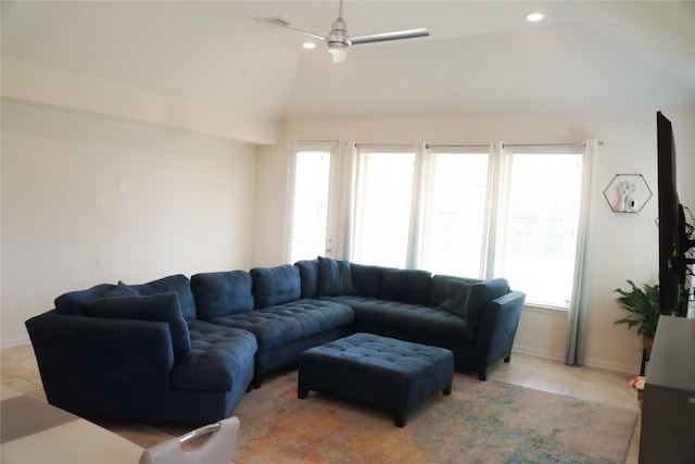 living room with baseboards, light tile patterned flooring, recessed lighting, ceiling fan, and vaulted ceiling