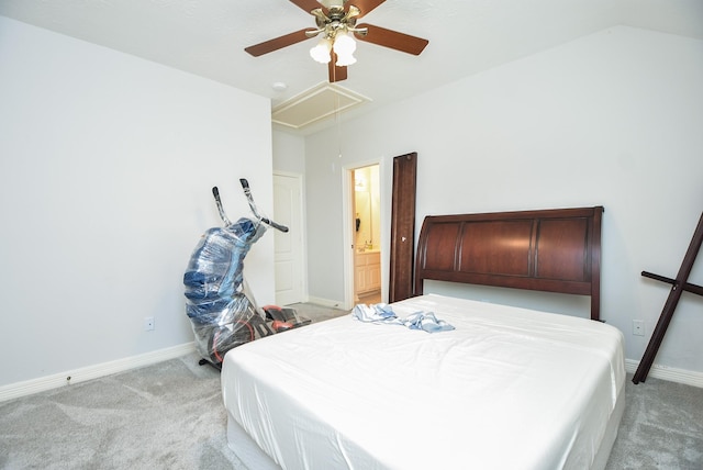 bedroom featuring light carpet, attic access, and baseboards