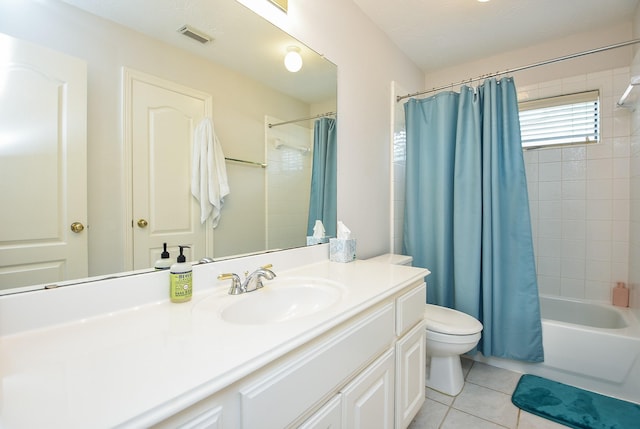 bathroom with visible vents, toilet, tile patterned flooring, shower / bath combination with curtain, and vanity