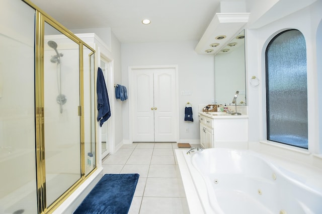 full bathroom with tile patterned floors, a shower stall, vanity, and a whirlpool tub