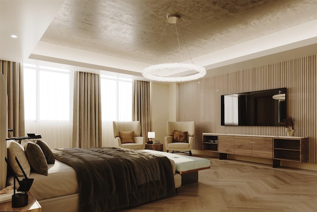 bedroom featuring a tray ceiling and recessed lighting