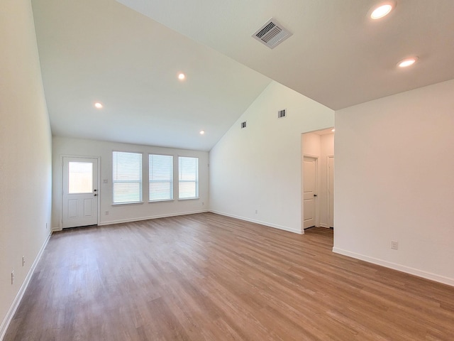 unfurnished room featuring recessed lighting, visible vents, baseboards, and wood finished floors