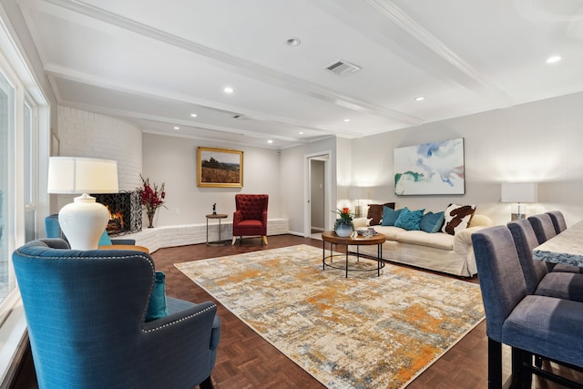 living room with visible vents, baseboards, recessed lighting, a fireplace, and beamed ceiling