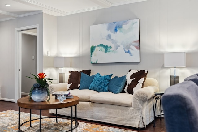 living area with wood finished floors, radiator heating unit, recessed lighting, crown molding, and baseboards