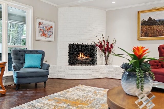 living area with recessed lighting, a brick fireplace, wood finished floors, and ornamental molding