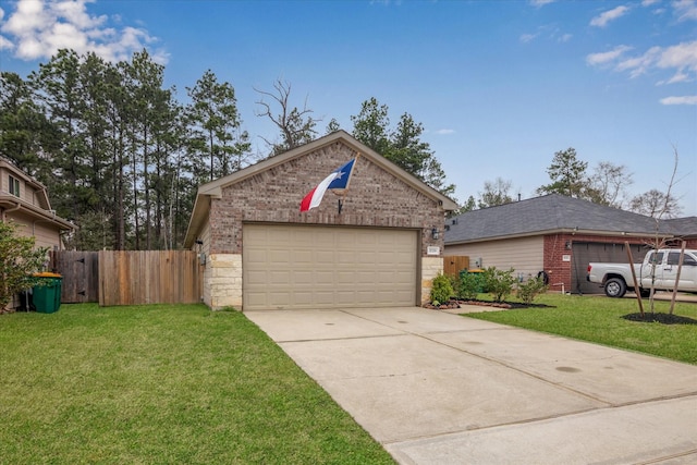 view of front of home with brick siding, a front lawn, driveway, and fence