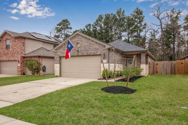 view of front of house featuring brick siding, concrete driveway, a front yard, and fence