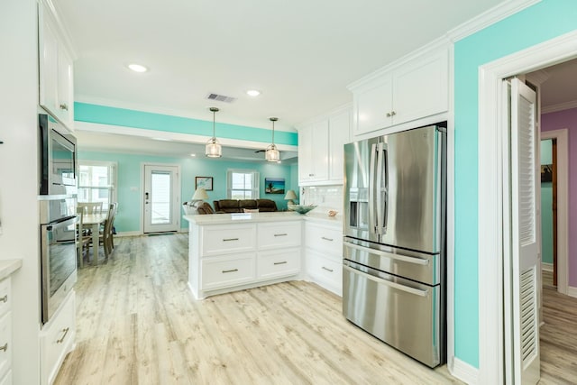 kitchen with visible vents, light wood-style flooring, a peninsula, stainless steel refrigerator with ice dispenser, and white cabinetry