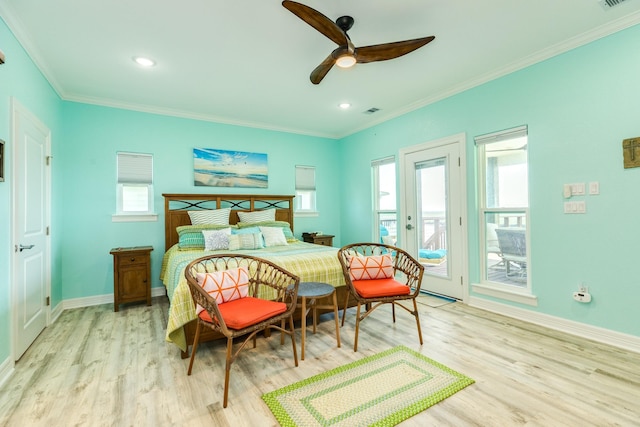 bedroom with light wood finished floors, crown molding, baseboards, and access to outside