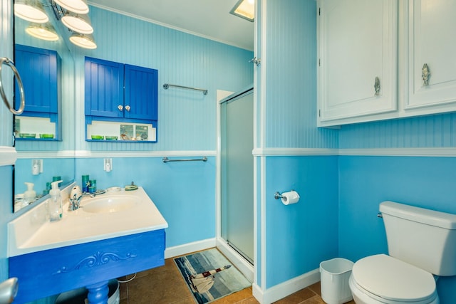 full bathroom with toilet, a stall shower, tile patterned flooring, baseboards, and vanity