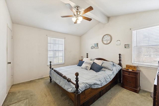 bedroom featuring light carpet, vaulted ceiling with beams, and a ceiling fan