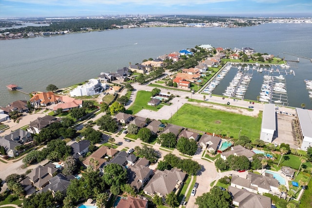 aerial view with a residential view and a water view