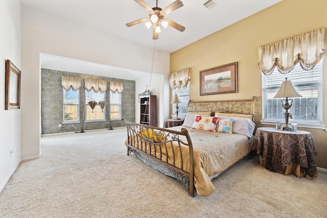 bedroom with visible vents, baseboards, and carpet