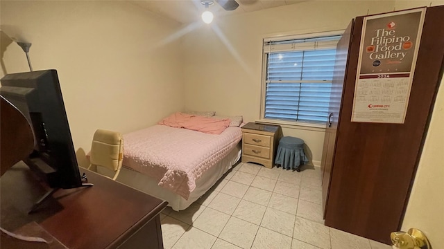 bedroom featuring light tile patterned floors