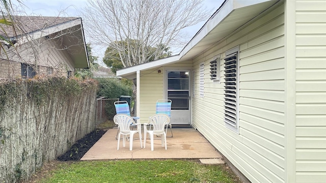 view of patio with fence