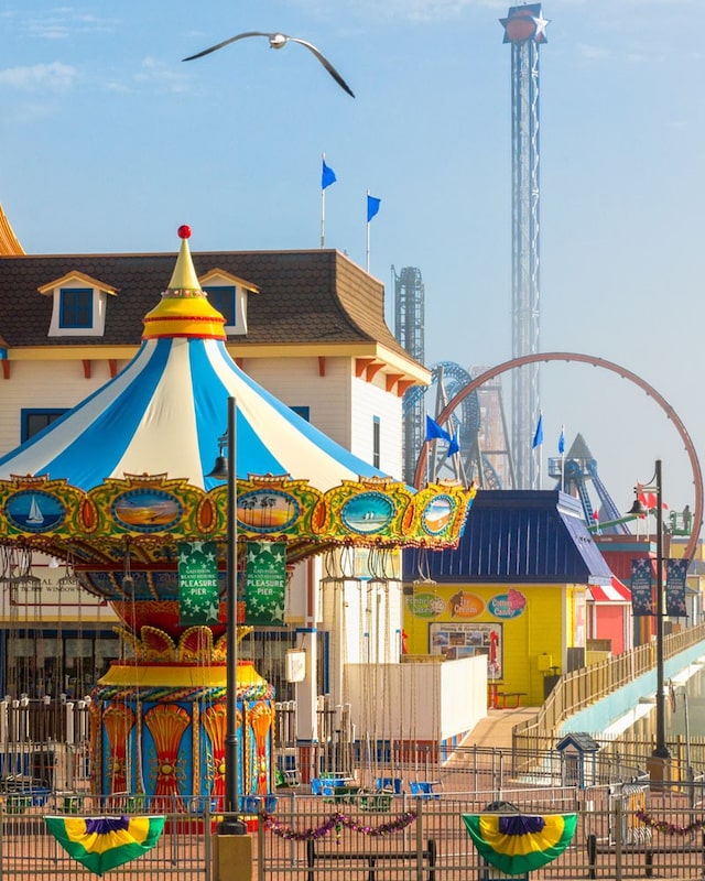 view of jungle gym with fence