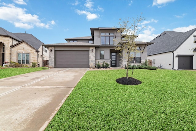 view of front of home featuring stucco siding, stone siding, concrete driveway, a front yard, and a garage