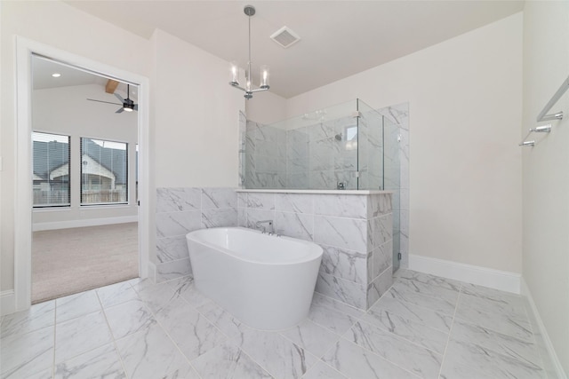 bathroom with visible vents, a marble finish shower, a soaking tub, vaulted ceiling, and marble finish floor