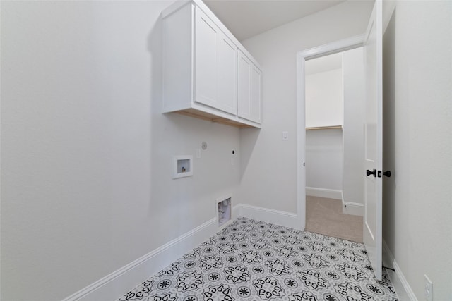 laundry area featuring gas dryer hookup, baseboards, hookup for an electric dryer, and hookup for a washing machine