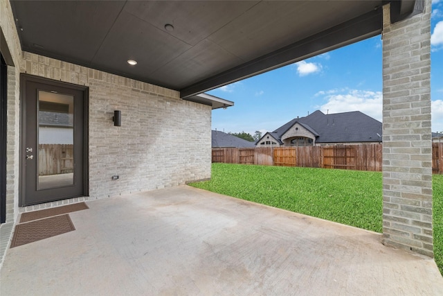 view of patio with fence