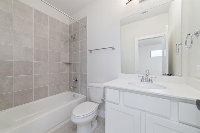 bathroom featuring visible vents, toilet, washtub / shower combination, tile patterned flooring, and vanity