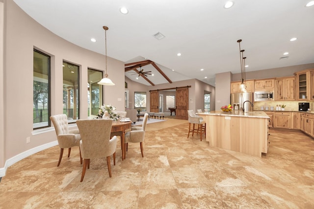 dining area featuring baseboards, visible vents, recessed lighting, vaulted ceiling, and a barn door