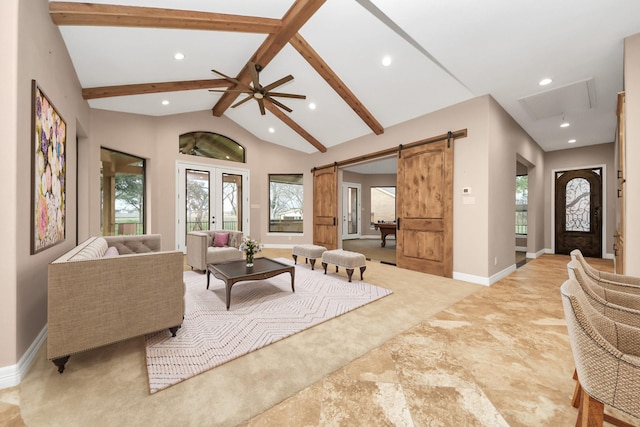 living area with beam ceiling, high vaulted ceiling, recessed lighting, a barn door, and baseboards