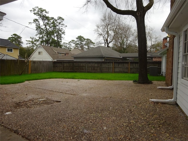 view of yard with a patio and a fenced backyard