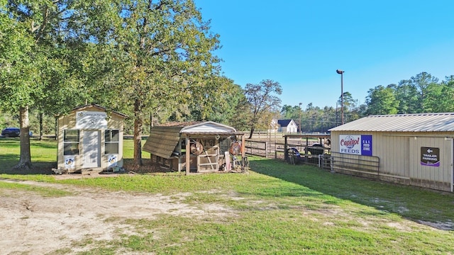 view of yard with an outdoor structure and exterior structure