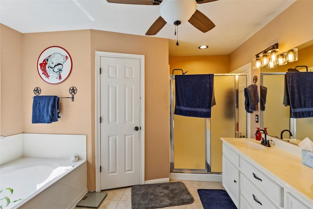 full bath with a garden tub, a stall shower, tile patterned floors, vanity, and a ceiling fan