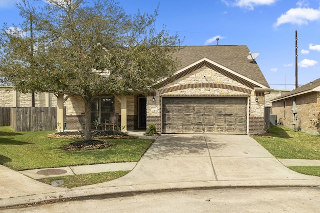 view of front of house featuring fence, driveway, an attached garage, a front lawn, and brick siding