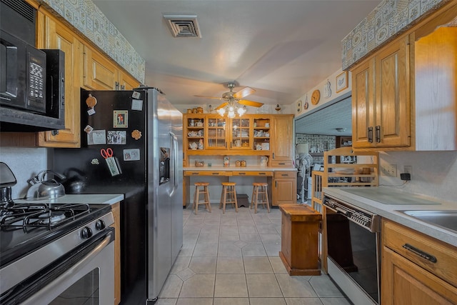 kitchen with visible vents, ceiling fan, light tile patterned flooring, black appliances, and open shelves