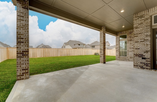 view of patio / terrace featuring fence