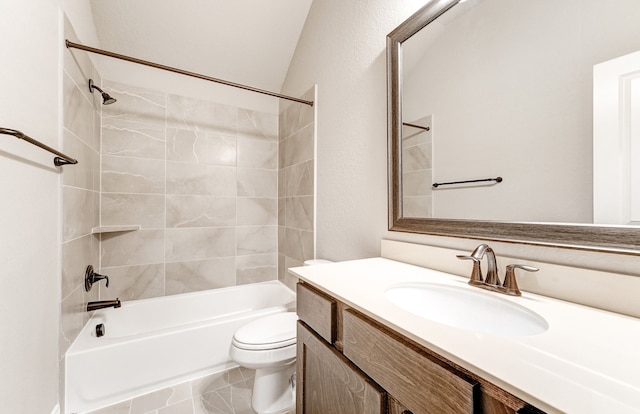 bathroom featuring vanity, toilet, and bathing tub / shower combination