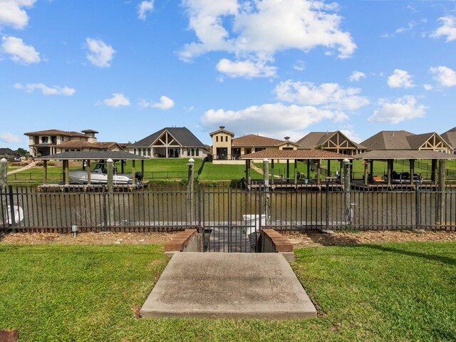 exterior space featuring a yard and fence