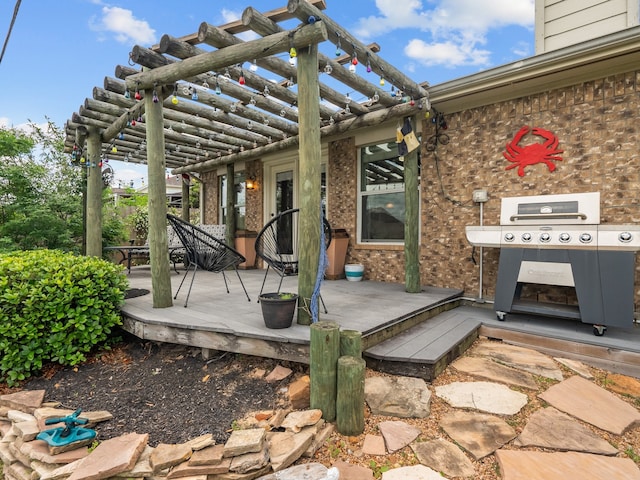 view of patio / terrace featuring grilling area, a deck, and a pergola