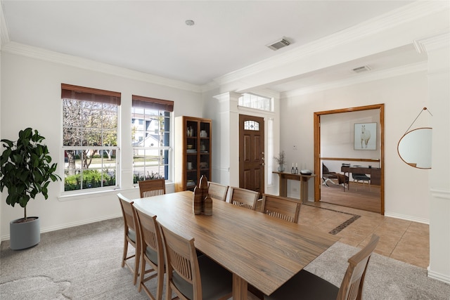 dining room with visible vents, ornamental molding, baseboards, and decorative columns