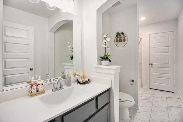 full bath with visible vents, baseboards, toilet, marble finish floor, and vanity