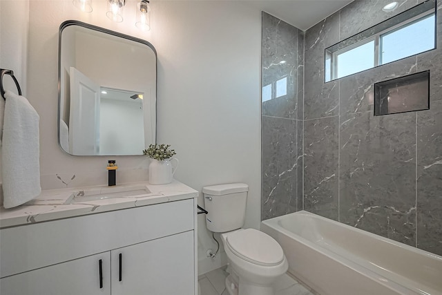 full bathroom with vanity, toilet, marble finish floor, and shower / bathtub combination