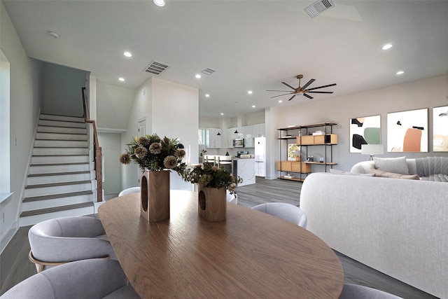 dining room with recessed lighting, visible vents, and dark wood-style floors