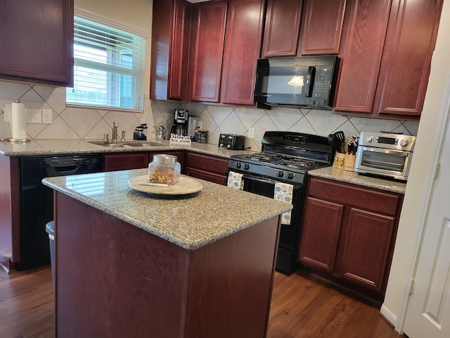 kitchen featuring dark wood-style floors, a sink, black appliances, tasteful backsplash, and reddish brown cabinets