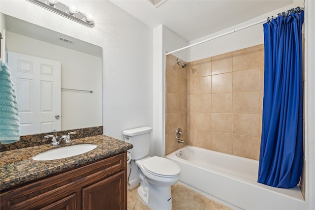 bathroom with visible vents, toilet, shower / bath combo with shower curtain, and vanity