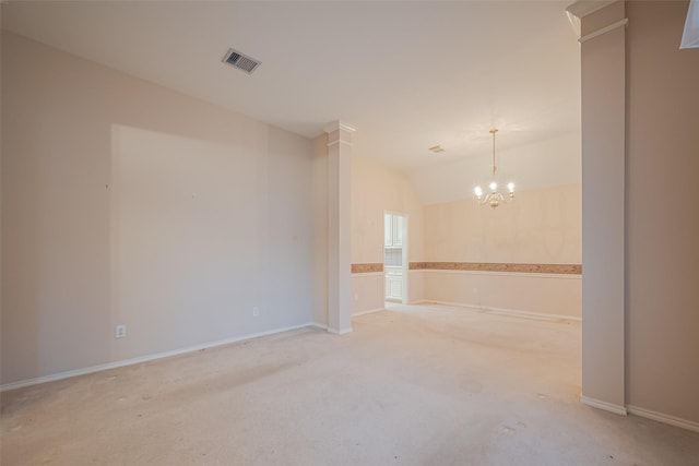 empty room featuring a notable chandelier, visible vents, baseboards, and lofted ceiling