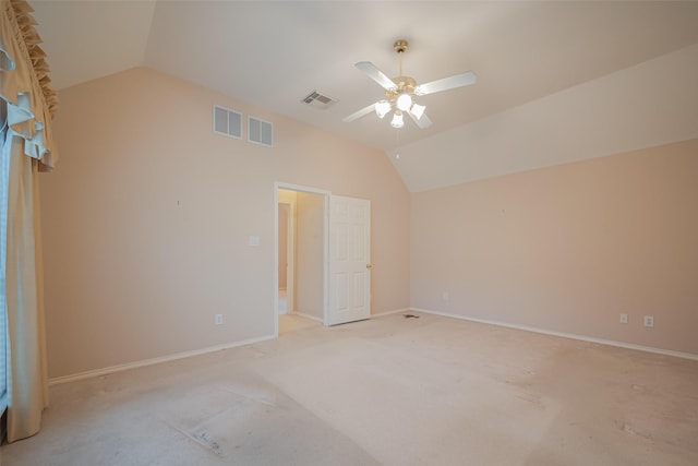 unfurnished bedroom with visible vents and lofted ceiling