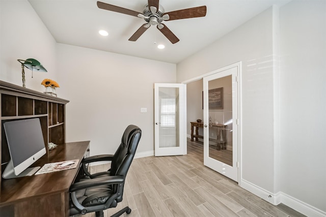 office featuring baseboards, recessed lighting, french doors, light wood-style floors, and a ceiling fan