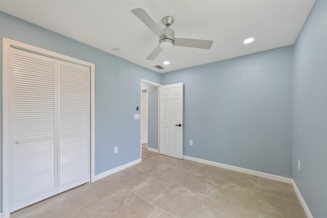 unfurnished bedroom with a ceiling fan, baseboards, visible vents, and a closet